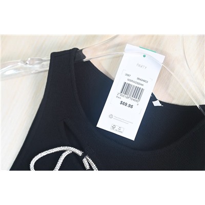 Трикотажный топ с круглым вырезом и вырезом на груди с декоративным шнурком из страз. Экспорт