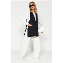 TRENDYOL MODEST Siyah Yandan Aksesuar Bağlama Detaylı Astarlı Dokuma Yelek TCTAW24YL00022