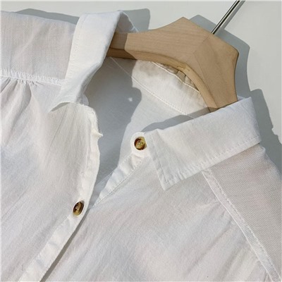 Белая хлопковая рубашка поло на пуговицах