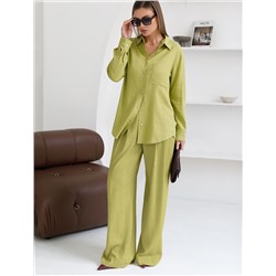 Свободная удлиненная блузка с карманом изо льна с вискозой