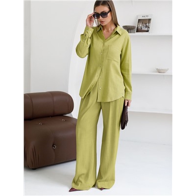 Свободная удлиненная блузка с карманом изо льна с вискозой