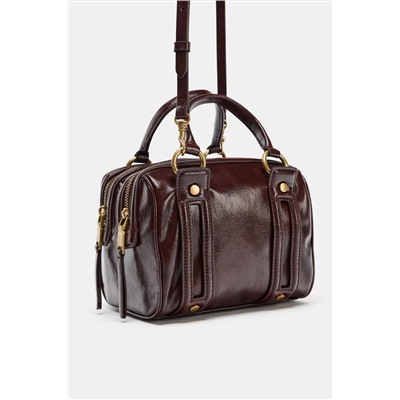 BOLSO DE MANO DETALLES METÁLICOS