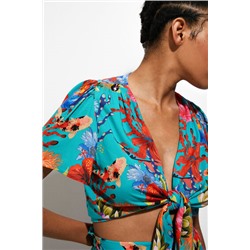 Blusa anudada corales