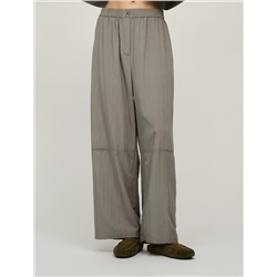 Зеленые брюки с вырезом ниже колена