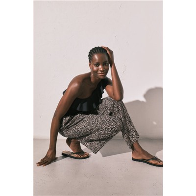 Chanclas dedo efecto ondas negras