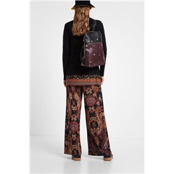 Jersey trampantojo bajo blusa