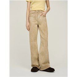 Бежевые джинсы с рельефными швами