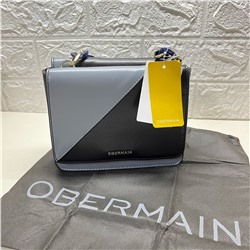 Мини-сумка немецкого бренда Obermai*n с акриловой уороткой цепочкой и длинным ремешком. Экспорт