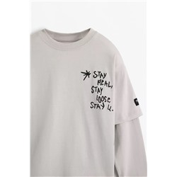 Camiseta doble manga