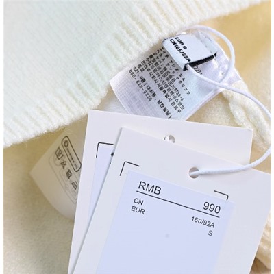 Свитер-пуловер с нишевым дизайном КО*С