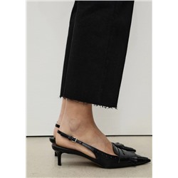 Jeans flare crop bolsillos