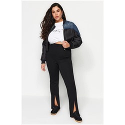 Trendyol Curve Siyah Yüksel Bel Paçası Yırtmaçlı Örme Pantolon TBBSS22PL00014
