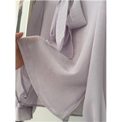 Элегантная, нежная блузка с длинными лентами на горловине