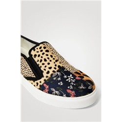 Sneakers slip on de piel