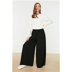 TRENDYOL MODEST Siyah Bol Paça Dokuma Pantolon TCTSS22PL0240