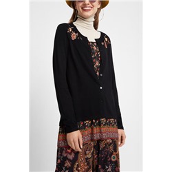 Jersey trampantojo bajo blusa