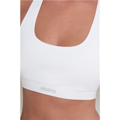 Top deportivo seamless canalé blanco