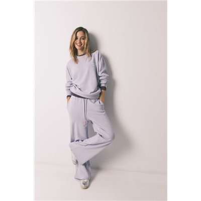 Pantalón largo flare felpa lila