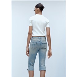 Jeans capri bolsillos