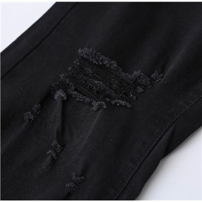 Женские джинсы-клеш с рваными краями