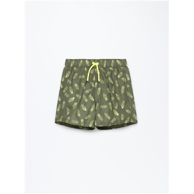 Tropical print swimming trunks