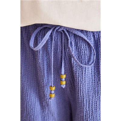 Pantalón corto azul textura gofrado