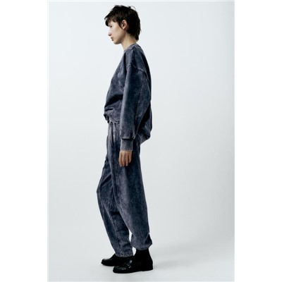 FADED-EFFECT CARROT FIT PLUSH TROUSERS