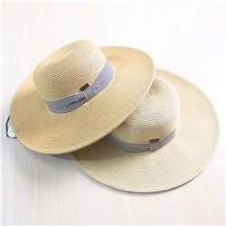 Элегантная соломенная шляпа с широкими полями.  Экспорт