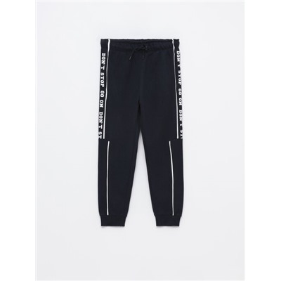 TRACKSUIT BOTTOMS WITH SIDE TAPING