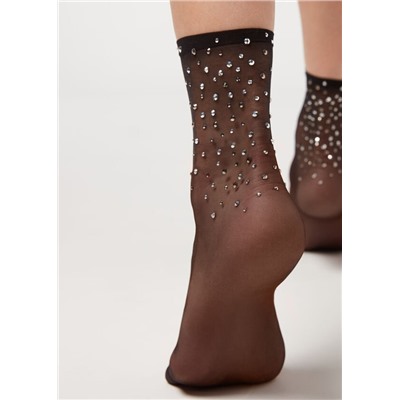 Transparente Socken mit Nieten