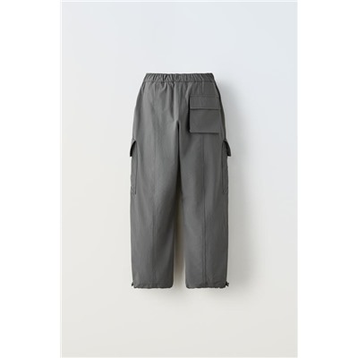 TECHNICAL TROUSERS WITH POCKETS