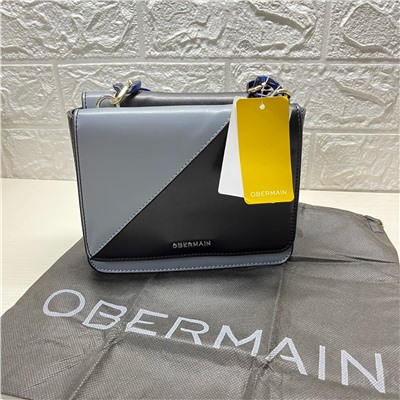 Мини-сумка немецкого бренда Obermai*n с акриловой уороткой цепочкой и длинным ремешком. Экспорт