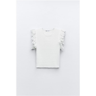 TEXTURED TOP WITH RUFFLE TRIMS